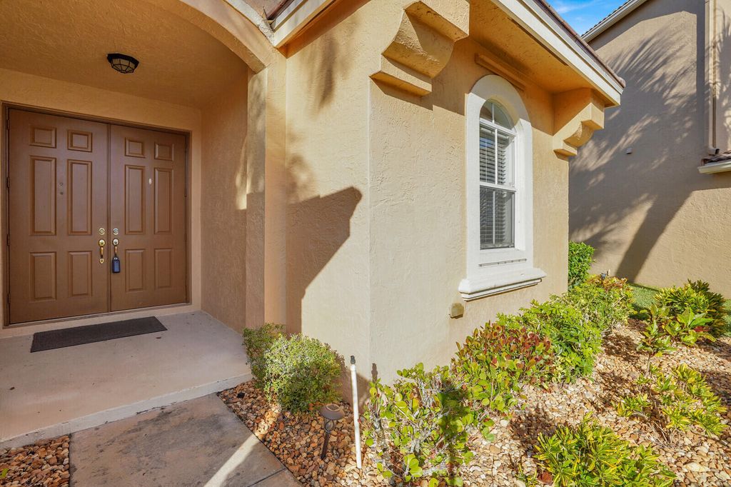 Photo of 7541 Downwinds Lane, Lake Worth, FL 33467 (MLS # B26028833)