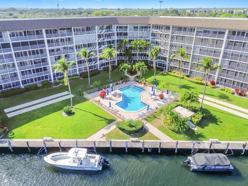 Photo of 390 N Federal Highway #202, Deerfield Beach, FL 33441 (MLS # R11158992)