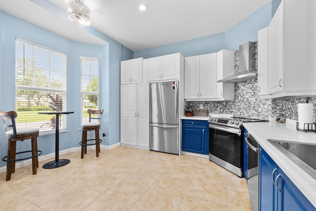 Photo of 10518 SW Westlawn Boulevard, Port Saint Lucie, FL 34987 (MLS # B26051648)
