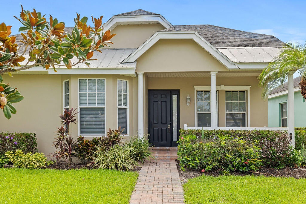 Photo of 10518 SW Westlawn Boulevard, Port Saint Lucie, FL 34987 (MLS # B26051648)