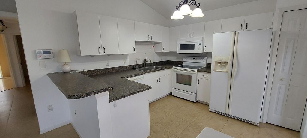 Photo of 719 NW San Remo Circle, Port Saint Lucie, FL 34986 (MLS # R11163500)