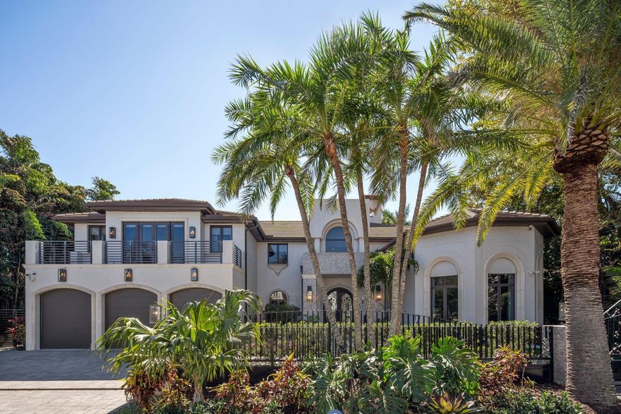 Stunning 8,000+ sq/ft  6 bedroom, 7.5 bathroom Harbor Beach renovated waterfront estate. This gated property is located on 100' of a deep water with southern exposure and is minutes to the inlet. The home is truly turnkey with modern, high-end finishes throughout. The beautiful eat-in kitchen is equipped with top of the line appliances and custom Italian cabinetry. Owners can take the private elevator to the 2nd floor master bedroom which is equipped with 2 walk-in closets and his and hers separate bathrooms. Upstairs has an additional 3 bedrooms and 2nd laundry room. Downstairs has 2 bedrooms, a media room/office, a beautiful marble built in bar with a wine display. The backyard has an oversized pool with attached hot tub, covered dining room and 100' dock. 3 car garage.