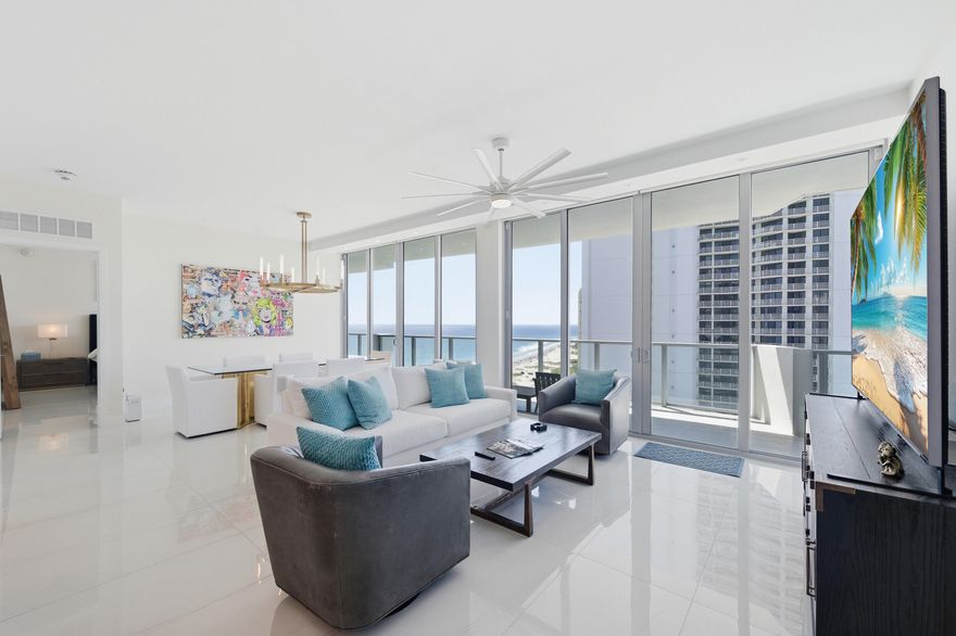 Upon entering this 15th floor residence you are greeted with vistas of both the Atlantic Ocean and the intracoastal waterway via a wall of floor-to-ceiling glass. Completed in 2023, this 1,600 SF open concept two bedroom 2.5 bathroom is outfitted with the advantages of modern living- impact windows throughout, wifi enabled smart home system, electric shades, custom Italkraft cabinetry, and Miele appliances.  Enjoy views and access to the oversized terrace from every room. The southern exposure awards natural light throughout the day, as well as oceanfront sunrises and sunsets overlooking Peanut Island.  Amrit offers its residents the conveniences of condo living, with the amenities of a luxury hotel including valet parking, beach service, room service, resort-style pools, concierge and access to a 100,000+ SF spa and wellness facility. The residence can be offered turnkey; the building is investor friendly as it allows for unlimited rentals.