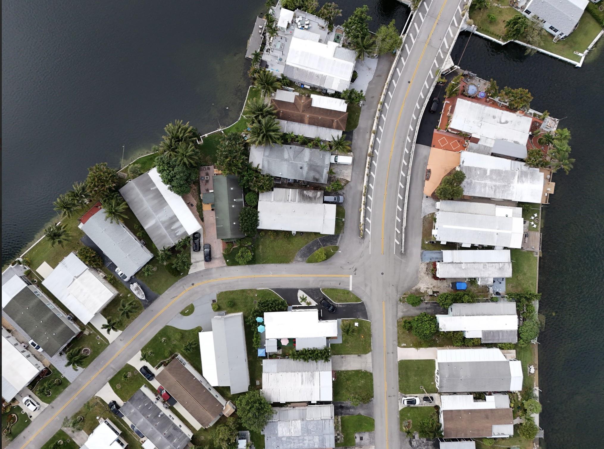 Looking for a place that's as charming as it is functional? Welcome to your new haven in The Estates of Fort Lauderdale! This 3-bedroom, 2-bathroom double-wide mobile home is the perfect blend of comfort and style. With 1,472 sq. ft. of space, this gem features recessed lighting, mirrored closet doors, and even comes fully furnished—just bring your toothbrush! The kitchen boasts stainless steel appliances, perfect for whipping up meals. The central AC keeps you cool while natural lighting warms up the vibe. Step onto your enclosed patio for fresh air or host a get-together in your corner lot with extra parking. Community pool and tennis courts are just steps away. All this for $2,450 a month! Schedule a tour today before it’s gone! Furniture can stay or be removed by request!