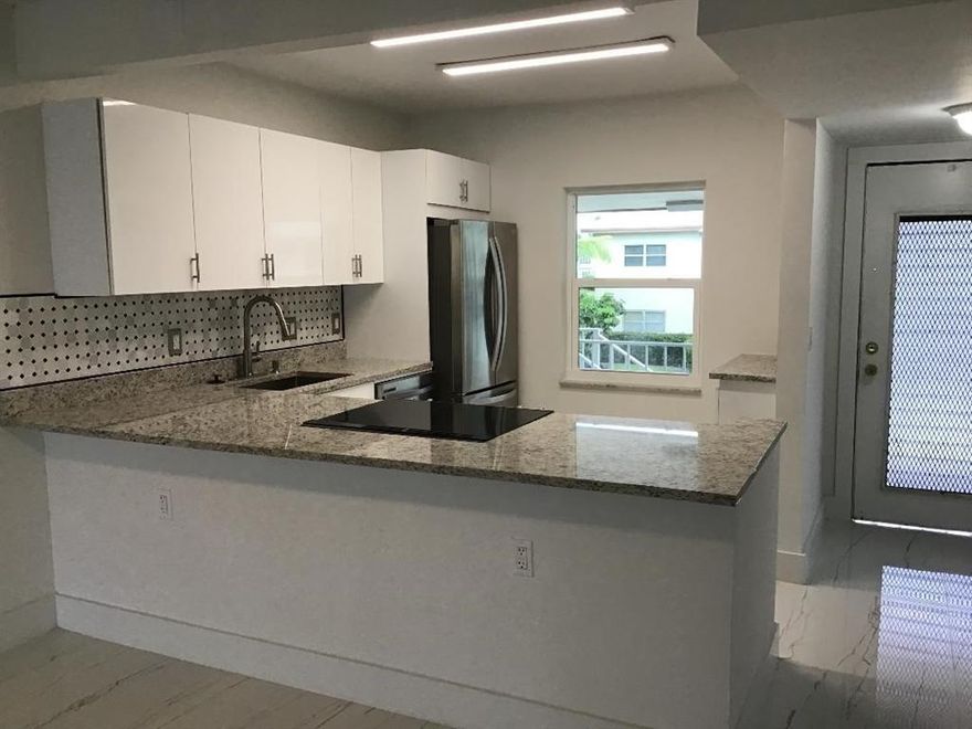 TOTALLY REMODELED * OPEN CONCEPT* 2 BEDROOM 2 BATH CONDO WITH BRAND NEW KITCHEN, STAINLESS STEEL REFRIGERATOR, DISHWASHER, OVEN. ALL NEW BATHROOMS, NEW IMPACT WINDOWS IN KITCHEN AND BEDROOMS. NEW MARBLE TILE THROUGHOUT CONDO. SCREENED PATIO. WALKING DISTANCE TO BRAND NEW PUBLIX TO BE FINISHED BY MID MARCH, WALGREENS, BANK, RESTAURANTS AND TRANSPORTATION. ASSOCIATION STATES 55+ COMMUNITY AND MUST HAVE 675+ CREDIT SCORE. ONLY ONE CAR ALLOWED PER UNIT. BASIC CABLE/WIFI, WATER, TRASH, PEST CONTROL INCLUDED.