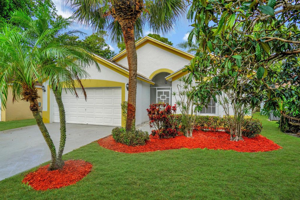 Photo of 130 Paddock Lane, Greenacres, FL 33413 (MLS # R11035751)