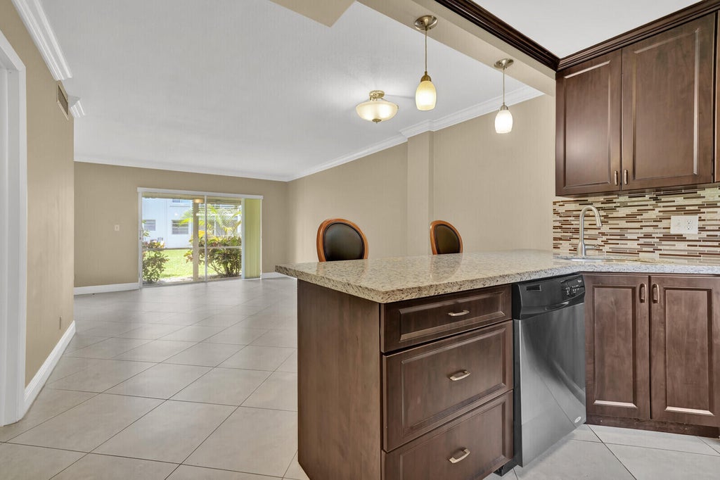 Photo of 5501 NW 2nd Avenue #111, Boca Raton, FL 33487 (MLS # B26025261)