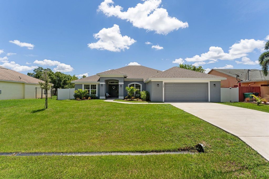 Photo of 137 NW Hibiscus Street, Port Saint Lucie, FL 34983 (MLS # R11000119)