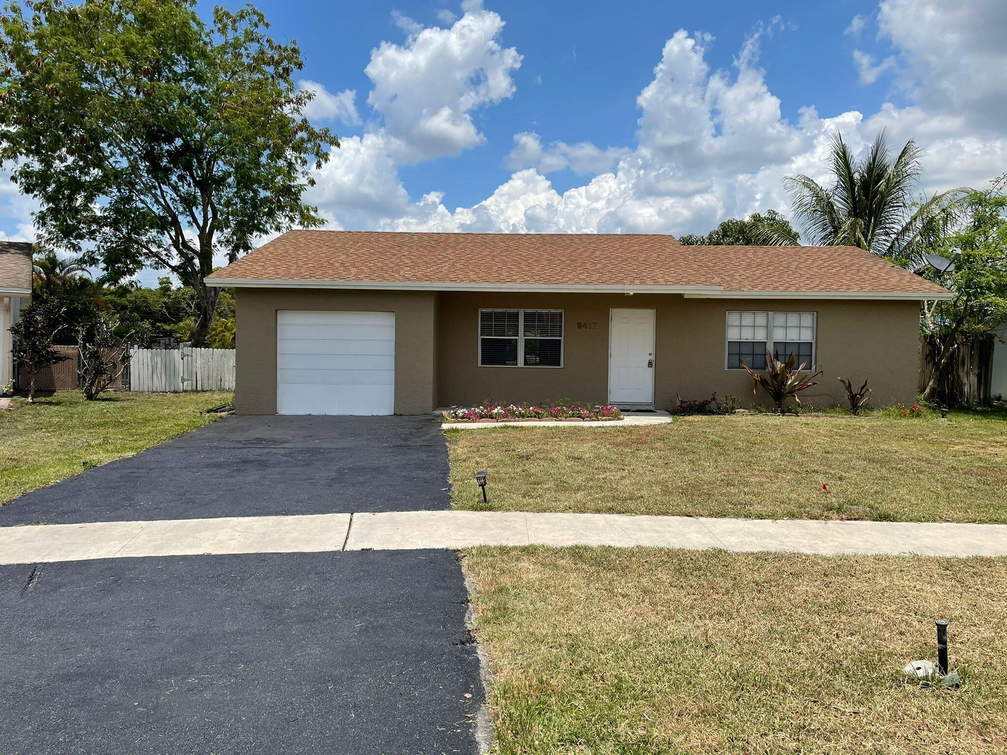 Great 3 bedroom 2 bath single family home in West Boca! Updated Kitchen with SS appliances as well as renovated bathrooms! Fenced in yard overlooking canal. Garage was converted into 3rd bedroom