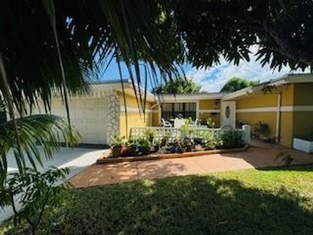 Photo of 660 Long Island Avenue, Fort Lauderdale, FL 33312 (MLS # F10465345)