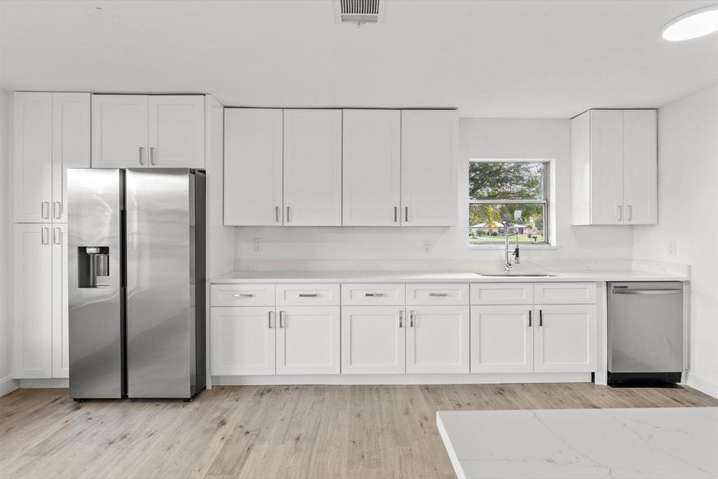 Photo of 1501 SE Burning Lane, Port Saint Lucie, FL 34952 (MLS # R11034162)