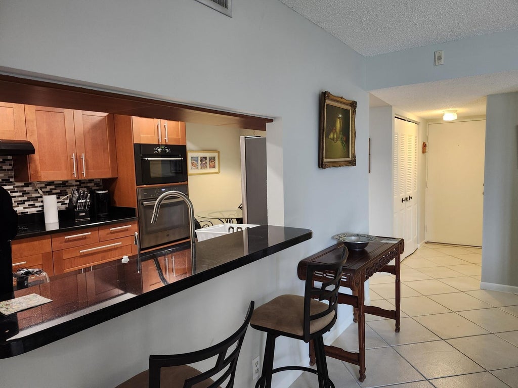 Photo of 450 Egret Circle, Delray Beach, FL 33444 (MLS # B26036517)