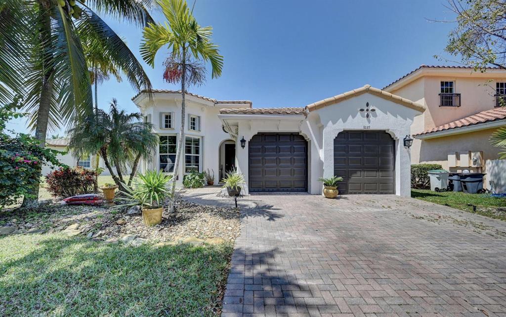 Beautiful 3 bed 2.5 bath home in the sought after community of Heron Bay! A rated schools, close to restaurants and shopping make this a great location! This home comes complete with ss appliances, granite counters, wood floors, solar panels that lower your monthly electric bill, high ceilings, open floor plan, sliding doors to the backyard, large master with dual sinks, walk in closets and so much more. Hurry and schedule your showing today before its too late.