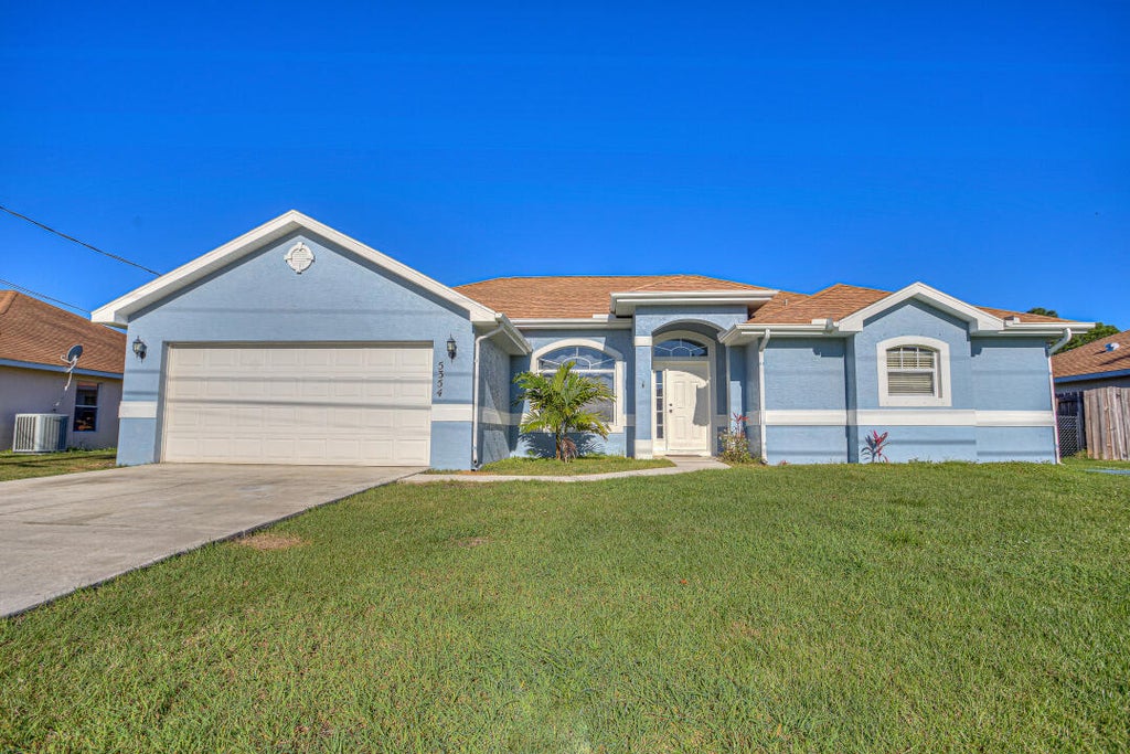 Photo of 5354 NW West Lanett Circle, Port Saint Lucie, FL 34986 (MLS # R10957050)