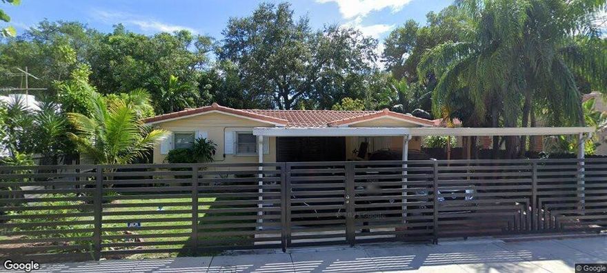 Well-maintained 3BR/2BA home in desirable Miami location! Features tile flooring throughout and an updated kitchen (2022). Enclosed side efficiency with kitchen and bath offers flexible living or potential income opportunity. Roof approx. 5 years old, central A/C, and hurricane shutters. Gated property with expanded front carport for ample covered parking. Convenient to major roads, shopping, dining, and more.Note- No Appliances included in the sale of this property. Great opportunity for homeowners or investors!