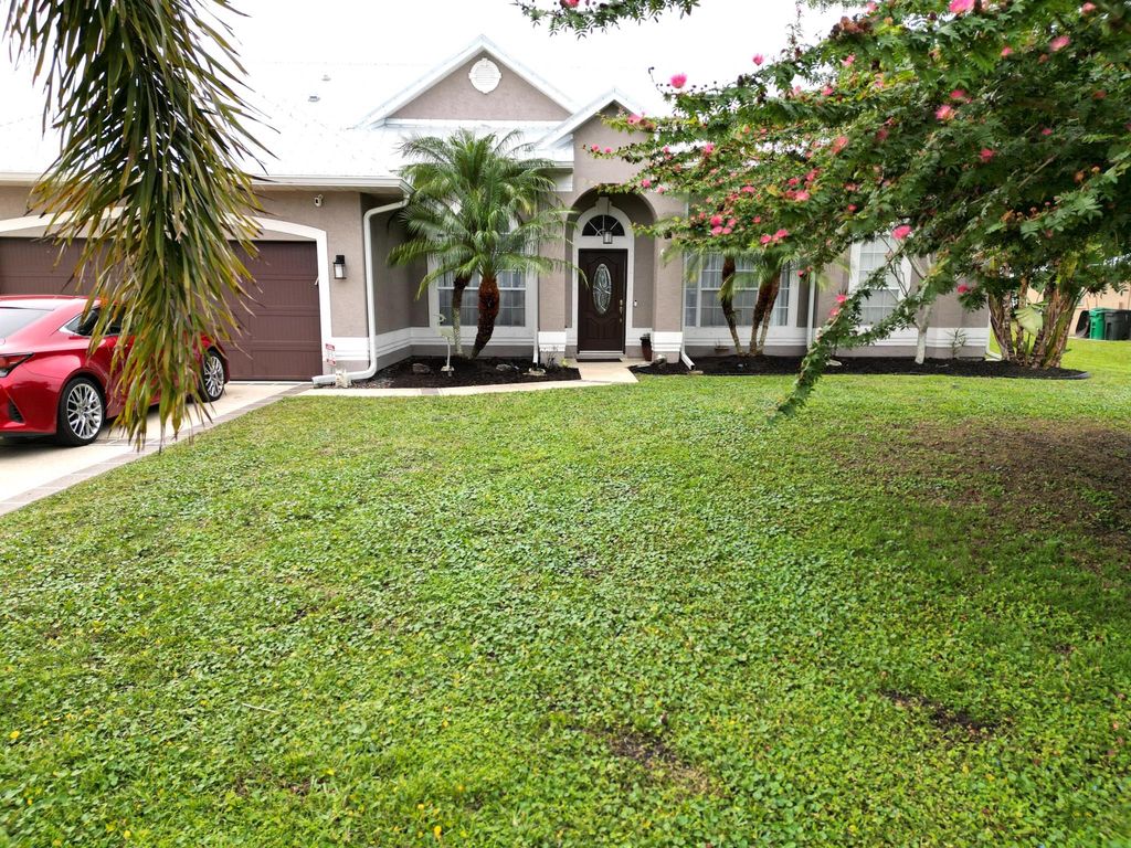 Photo of 183 NE Caprona Avenue, Port Saint Lucie, FL 34983 (MLS # R10956012)