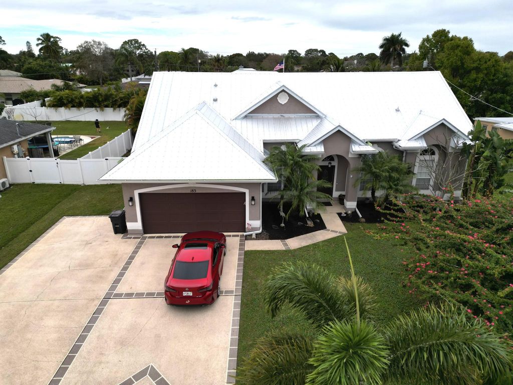 Photo of 183 NE Caprona Avenue, Port Saint Lucie, FL 34983 (MLS # R10956012)