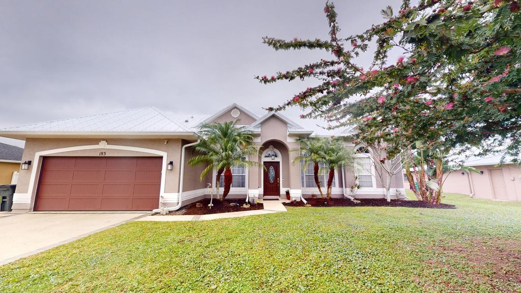 Photo of 183 NE Caprona Avenue, Port Saint Lucie, FL 34983 (MLS # R10956012)