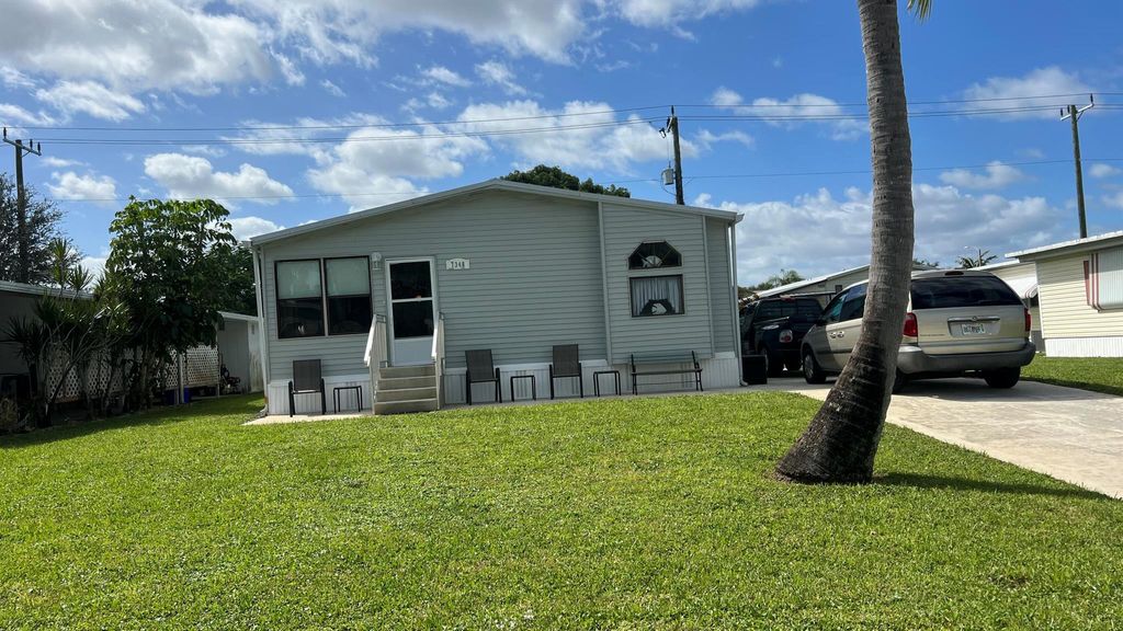Photo of 7348 SE Swan Avenue, Hobe Sound, FL 33455 (MLS # R10930892)