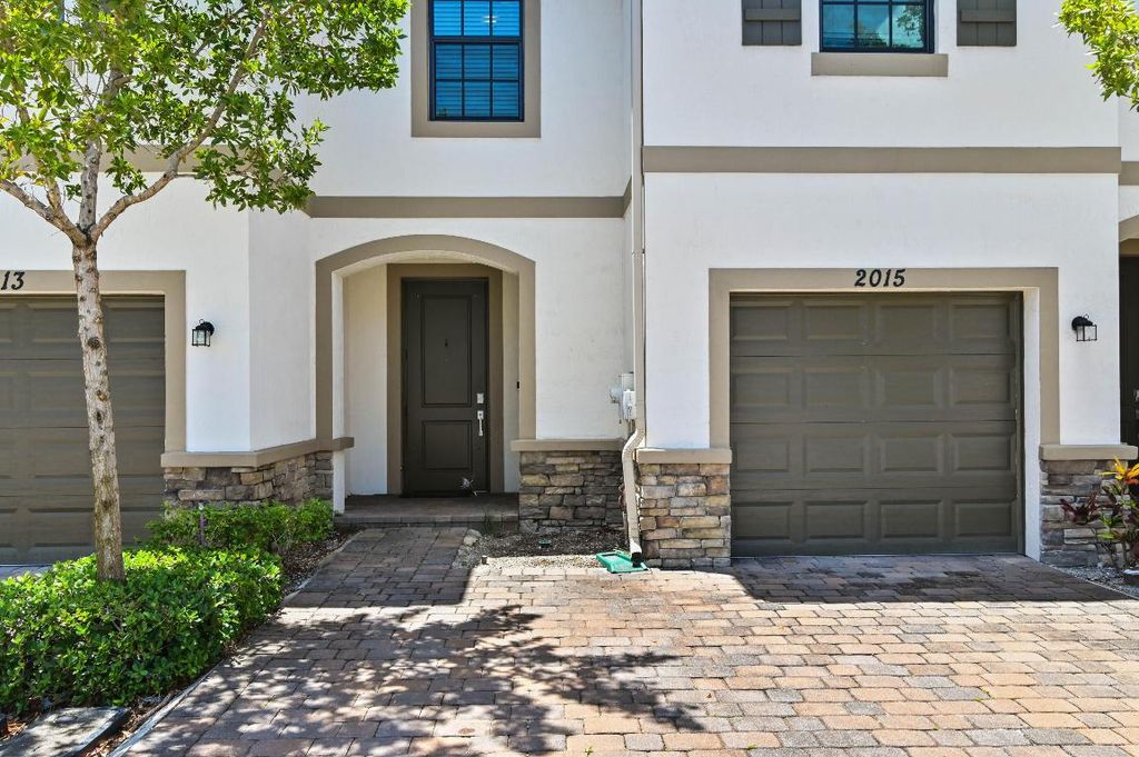 Photo of 2015 Tamarind Drive, Riviera Beach, FL 33410 (MLS # R10989989)