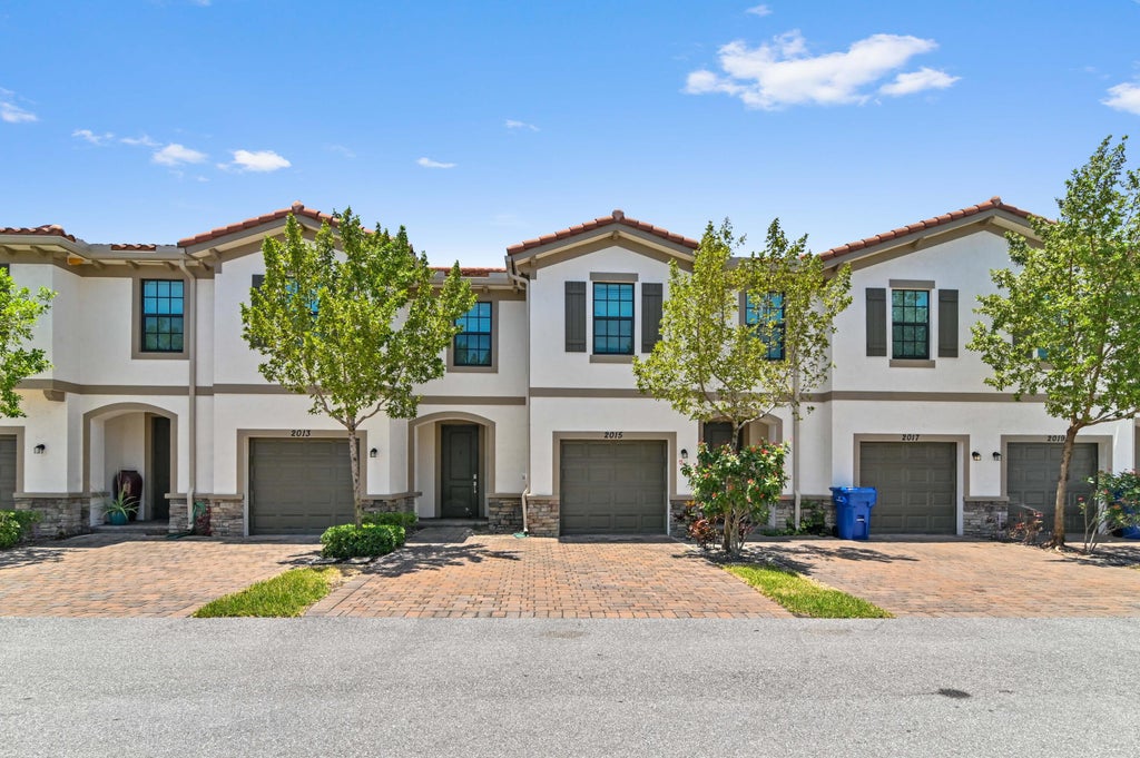 Photo of 2015 Tamarind Drive, Riviera Beach, FL 33410 (MLS # R10989989)