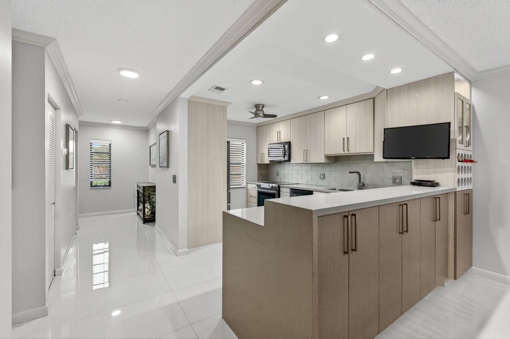 Photo of 8450 Casa Del Lago #J, Boca Raton, FL 33433 (MLS # R11134584)