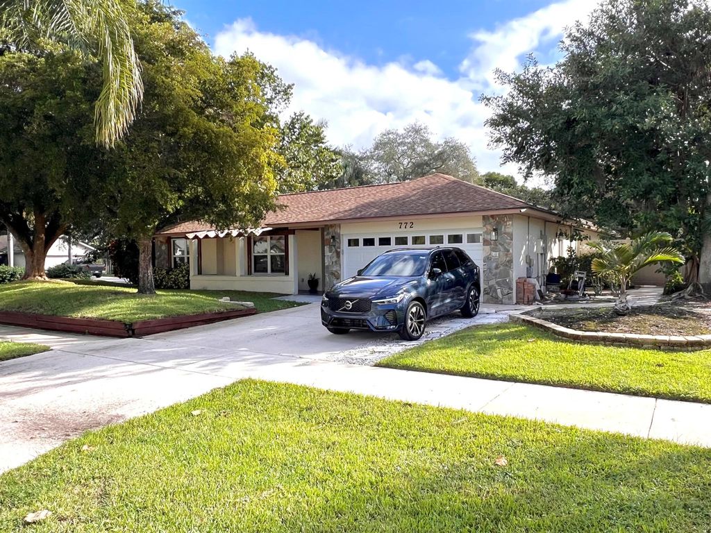 Photo of 772 NW 41st Terrace, Deerfield Beach, FL 33442 (MLS # R11138057)