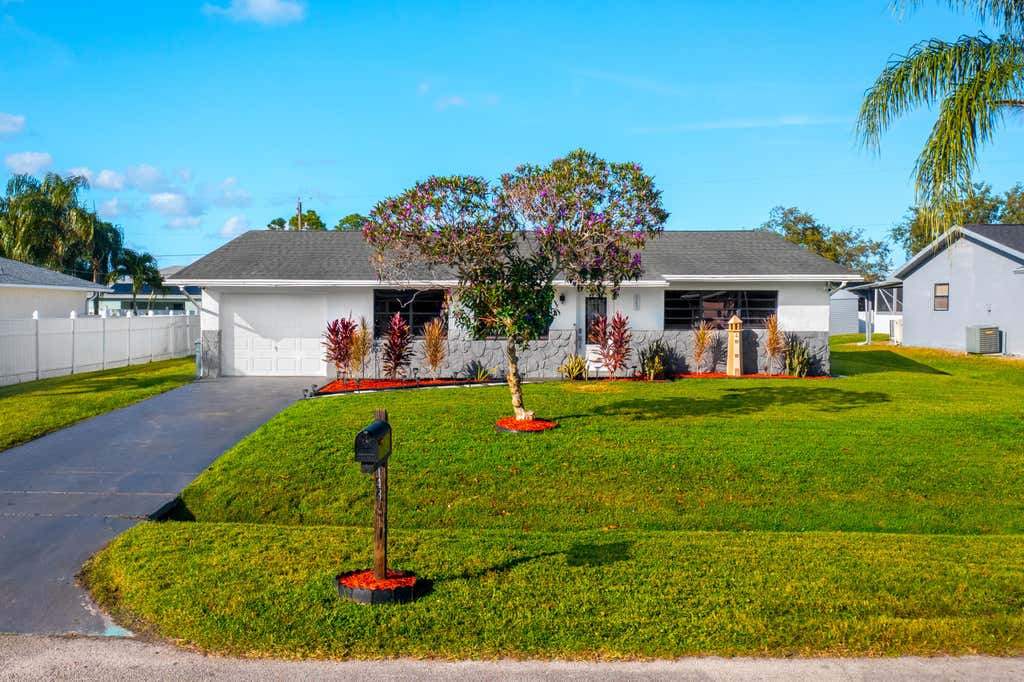 Photo of 143 SW Grove Avenue, Port Saint Lucie, FL 34983 (MLS # R10932943)