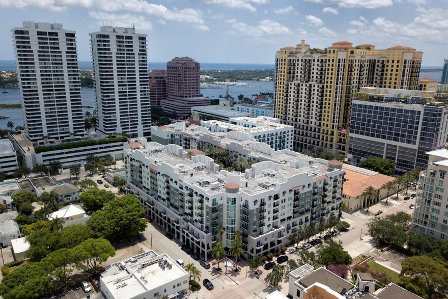 Oversized 1/1 with expansive balcony available in The Prado! This unit boasts a larger one bedroom floor plan and the balcony expands for all of the living room & bedroom. Large walk in closet and washer/dryer in the unit. Same floor parking. Unit freshly painted and new carpet is being installed. This building is in the heart of downtown steps away from everything you need. The Prado offers premium amenities with 24 hour front desk, fitness center, covered garage parking, community pool and much more.