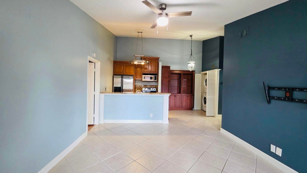 Photo of 6314 CHASEWOOD Drive #E, Jupiter, FL 33458 (MLS # B26073302)