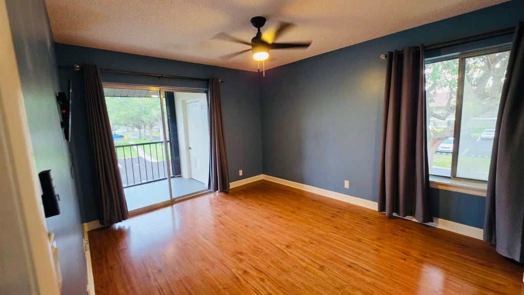 Photo of 6314 CHASEWOOD Drive #E, Jupiter, FL 33458 (MLS # B26073302)