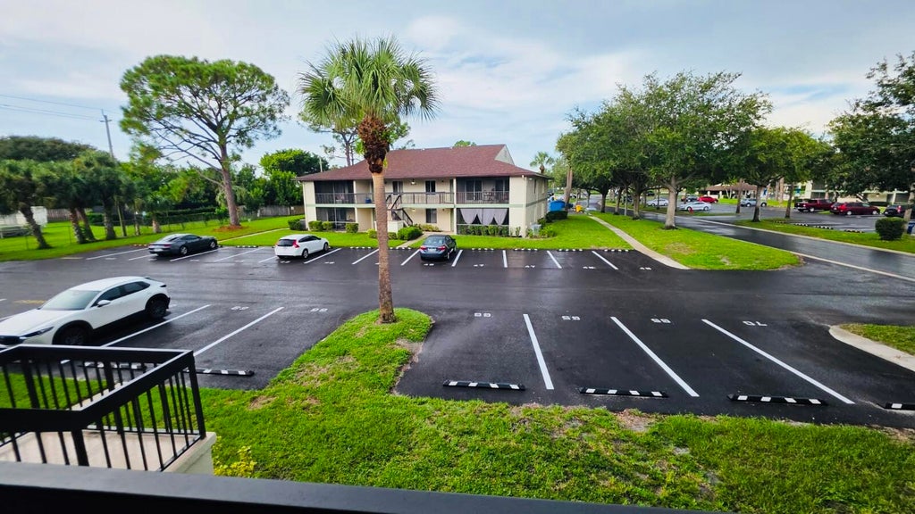 Photo of 6314 CHASEWOOD Drive #E, Jupiter, FL 33458 (MLS # B26073302)
