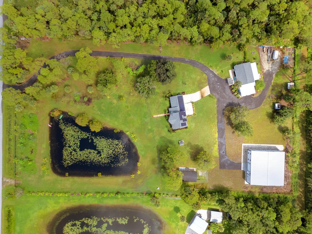 Photo of 7058 SW Wedelia Terrace, Palm City, FL 34990 (MLS # R11023017)
