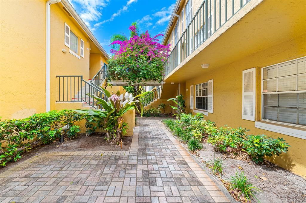 Photo of 1025 Lake Shore Drive #102, Lake Park, FL 33403 (MLS # R10784526)