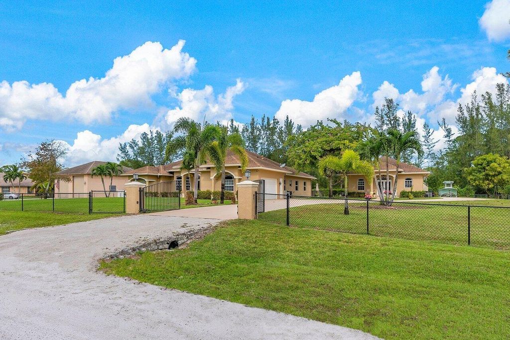 Photo of 14453 77th Place N, The Acreage, FL 33470 (MLS # R10949152)