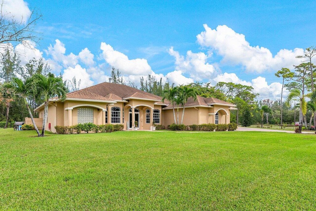 Photo of 14453 77th Place N, The Acreage, FL 33470 (MLS # R10949152)