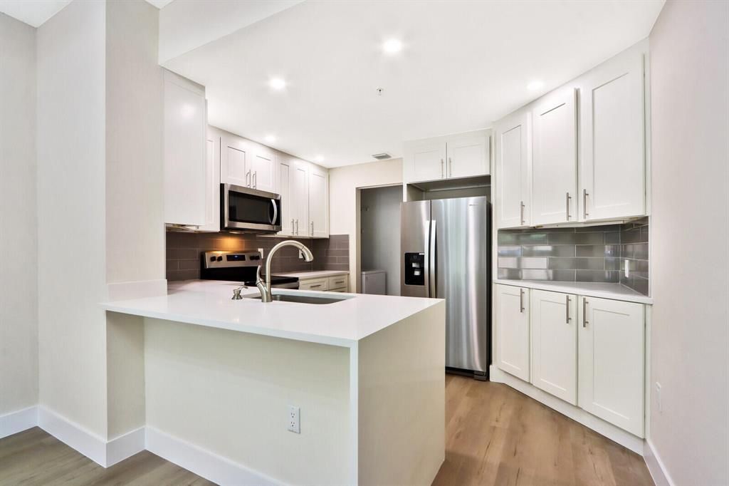 Photo of 2801 Sarento Place #105, Palm Beach Gardens, FL 33410 (MLS # R10816997)