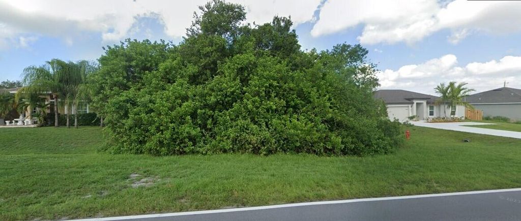 Photo of 3764 SW Darwin Drive, Port St Lucie, FL 34953 (MLS # R10924427)