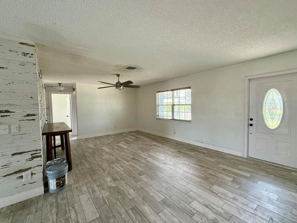 Photo of 1567 NE 21st Terrace W, Jensen Beach, FL 34957 (MLS # R11129733)