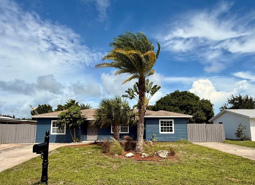 Welcome to this charming single-story Florida home ideally situated in the heart of Jensen Beach on a quiet residential street in a well-established neighborhood. Boasting 4 bedrooms and 2 full bathrooms across approximately 1,603 square feet of living space, this residence blends comfort, style, and convenience.  This property captures the best of coastal Florida living: a solid home in a prime location, with strong bones and numerous updates. Whether you're looking for family space, a vacation retreat, or a year-round haven, this property offers tremendous upside and lifestyle appeal.  Property features two large concrete driveways ideal for storing your cars, boats and RV's.  Fresh exterior and interior paint.