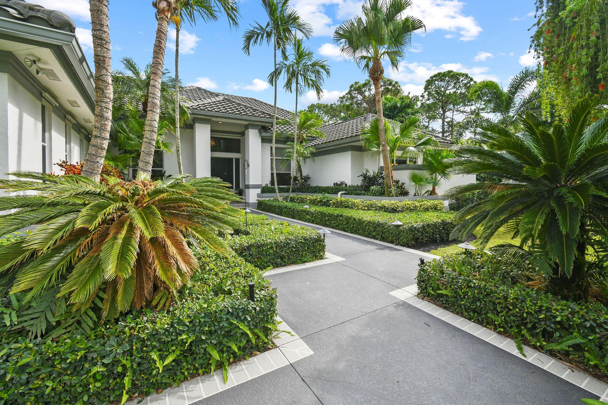 Discover unparalleled luxury in this newly renovated estate, nestled on 1.6 acres in Island Country Estates. It features a grand chef's kitchen with high-end Thermador appliances, a 48-inch gas range, & a built-in espresso machine. The Primary BR is a retreat with a resort-level en-suite, complemented by two additional bedrooms w/ spa-like en-suites, & a chic cabana bathroom. Highlights include a magnificent heated saltwater pool within a large screened patio, and lush professional landscaping. The home boasts 14'-16' ceilings, large windows, custom window coverings, & exquisite lighting. With a 3-car garage, 250 gal propane tank, and readiness for a whole home generator. Gated community. This exquisite custom remodeled estate residence delivers comfort, elegance, & modern convenience!