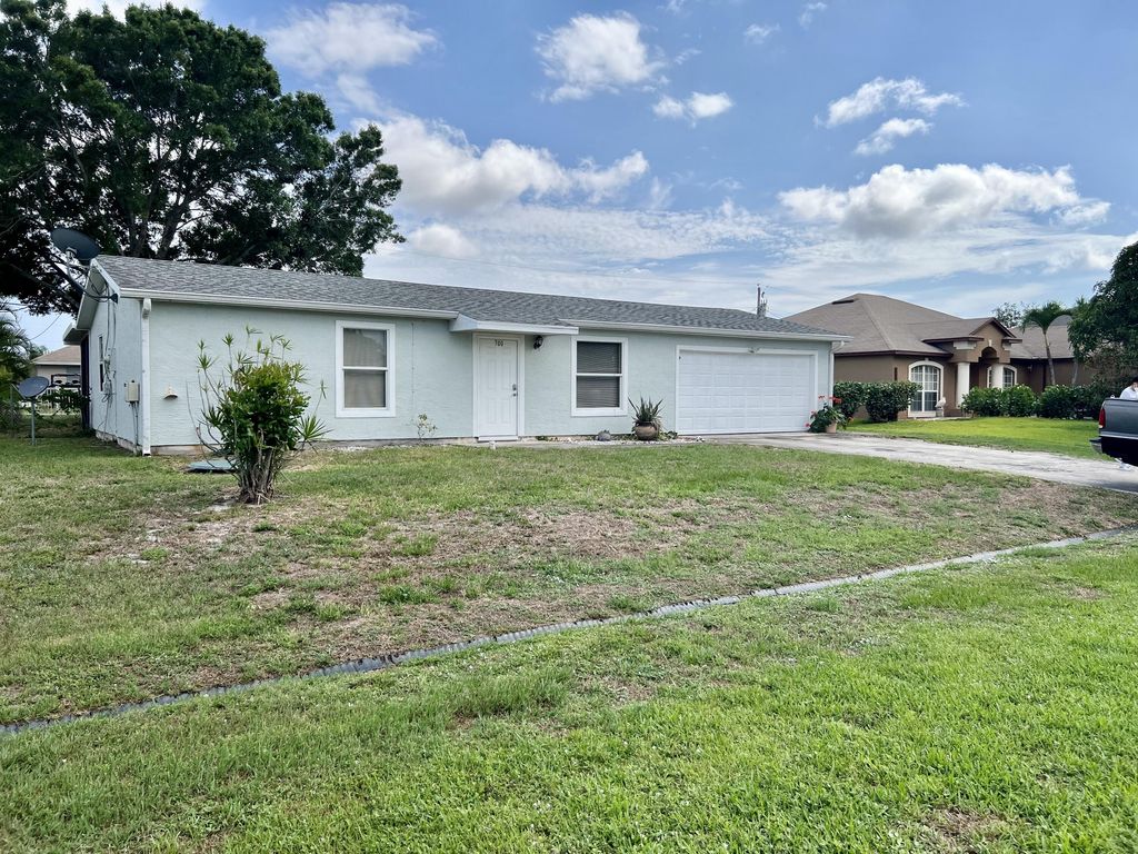 Photo of 700 SW Sareta Avenue Ave, Port St Lucie, FL 34953 (MLS # R10804290)