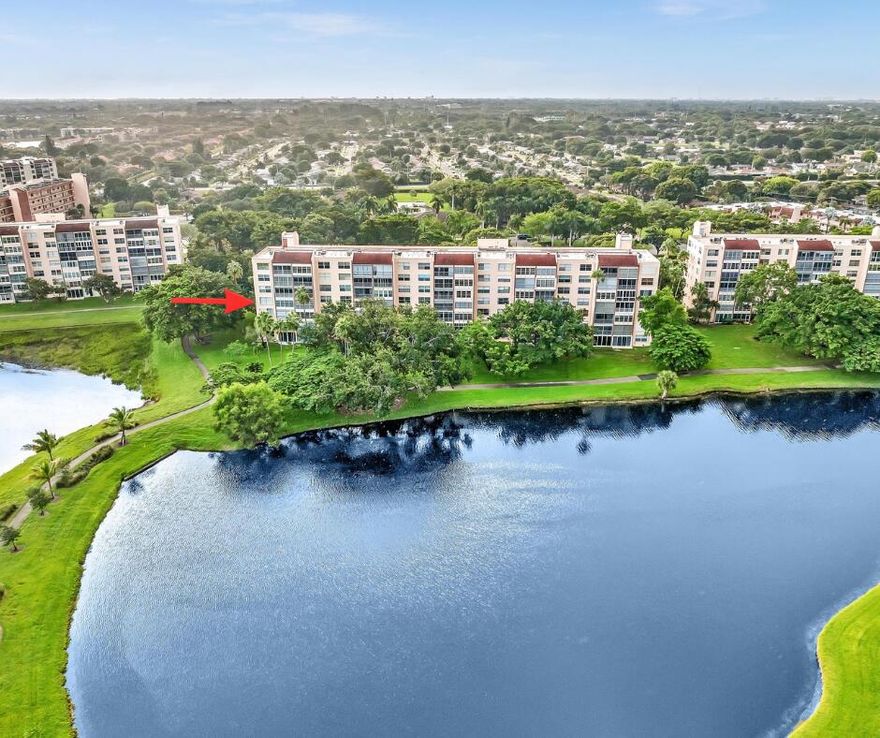 Enjoy serene lake views from this 4th-floor 2BR/2BA end-unit condo available furnished ( or unfurnished) in the desirable Bonaire at Villages of Oriole, a 55+ community. Light-filled residence features an updated kitchen with pass-through to the living area, in-unit stacked washer/dryer. Relax on the spacious balcony overlooking water and walking trails. Located directly across from the clubhouse and pool. The active 55+ community offers an array of amenities, including a clubhouse with a pool, party room, fitness center, billiards, and shuffleboard. Located just minutes from the beach, trendy downtown Delray, and the Delray Marketplace, this delightful home is the perfect blend of comfort and convenience.