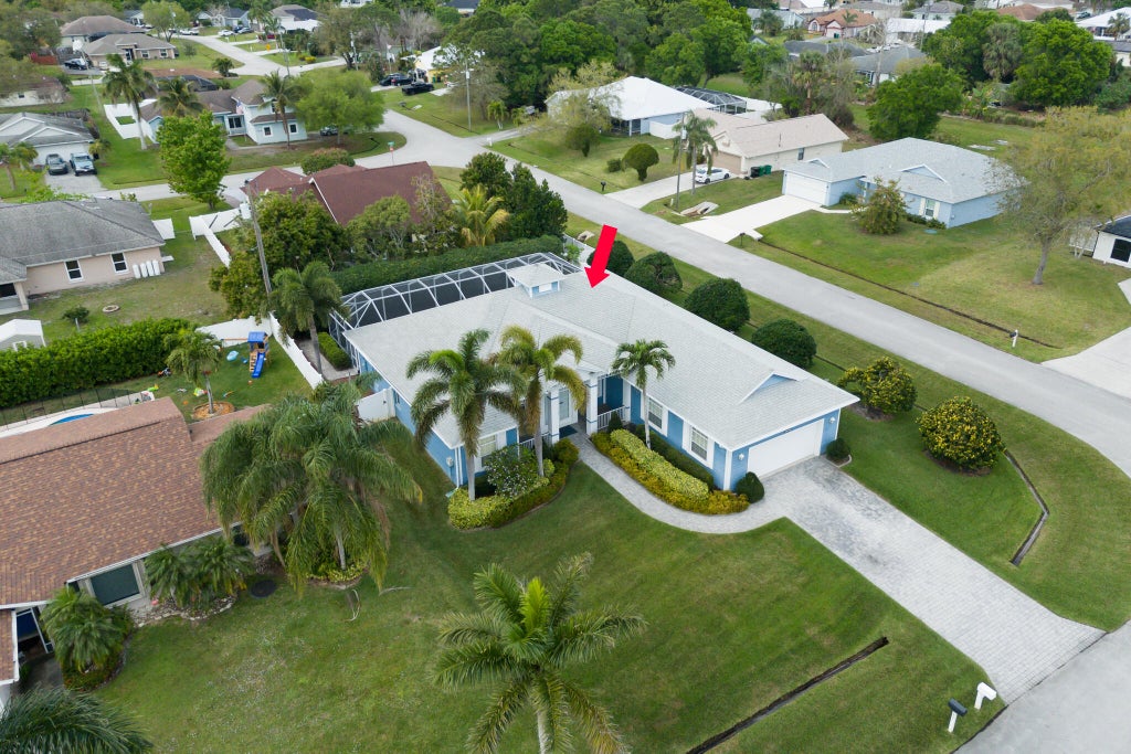 Photo of 1902 SW Beekman Street, Port Saint Lucie, FL 34953 (MLS # R11063403)