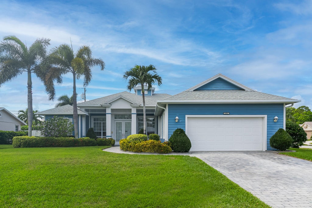 Photo of 1902 SW Beekman Street, Port Saint Lucie, FL 34953 (MLS # R11063403)