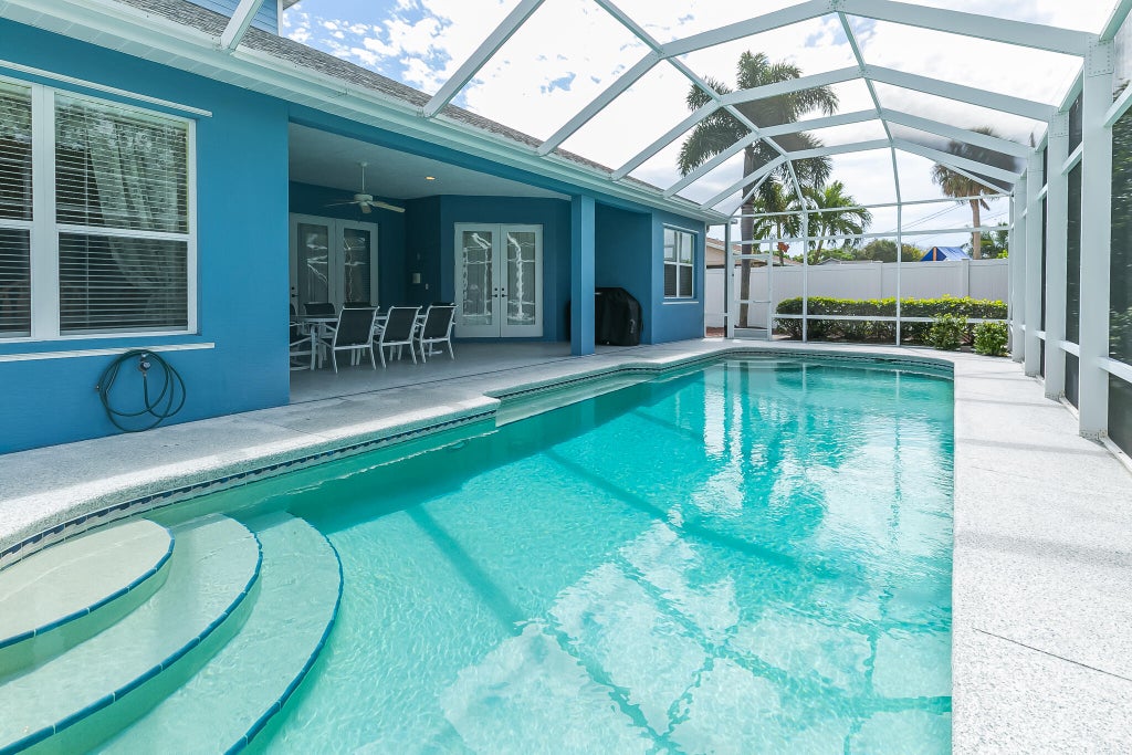 Photo of 1902 SW Beekman Street, Port Saint Lucie, FL 34953 (MLS # R11063403)
