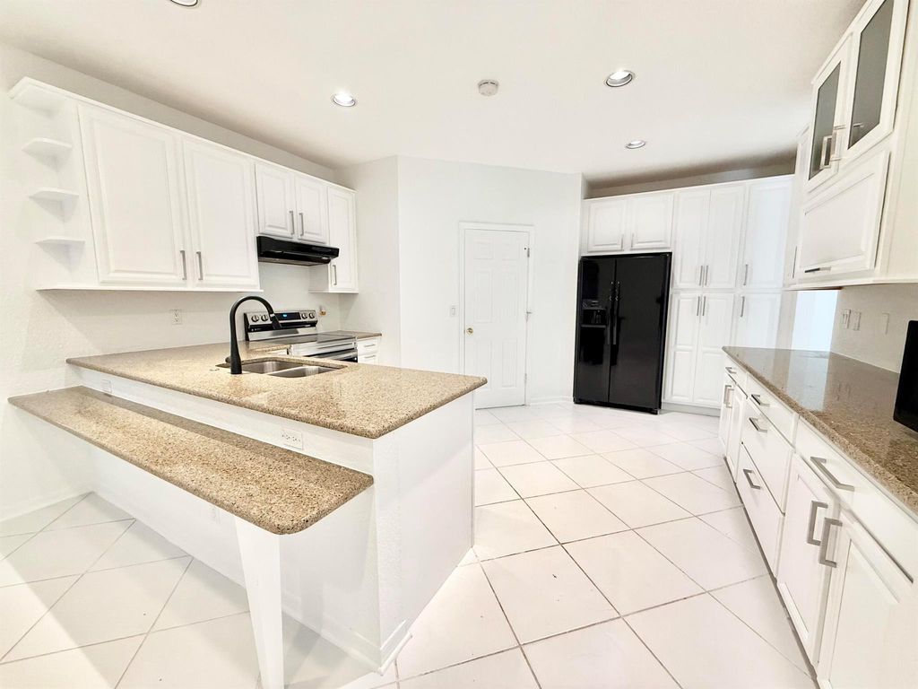 Photo of 12310 Riverfalls Court, Boca Raton, FL 33428 (MLS # R11099456)