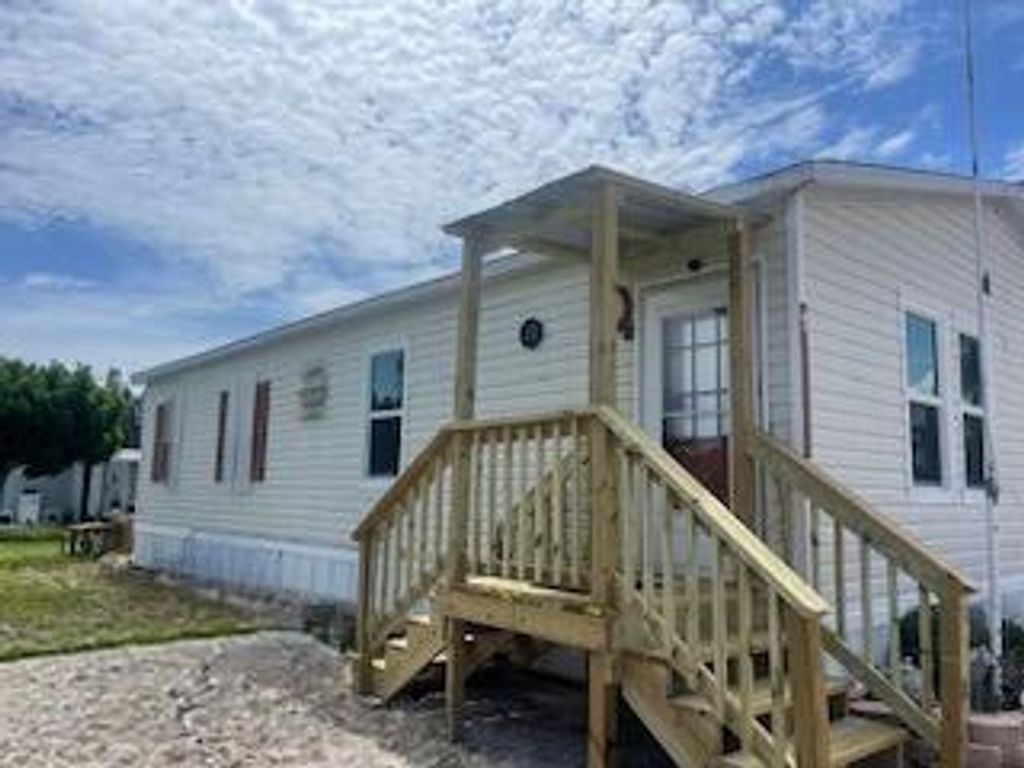 Photo of 8075 SE Wren Avenue, Hobe Sound, FL 33455 (MLS # R11011458)