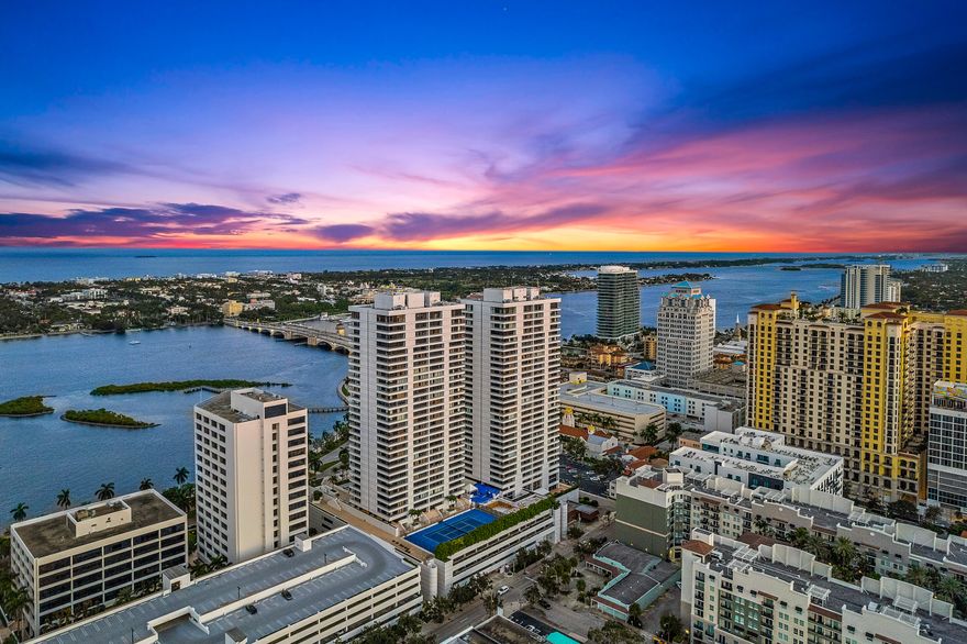 This is your opportunity to elevate your lifestyle and find a home in one of the grandest, opulent, high-rise buildings in Downtown West Palm Beach! Combined two units, you'll have a sprawling, approximately 4,018-sqft property with many of the luxuries and amenities you could imagine. This one-of-a-kind corner apartment features two large main suites, two guest bedrooms, one additional full bathroom, and two half baths, so you will have plenty of room to accommodate family and/or guests. There are two well-equipped kitchens both of them with high-end stainless steel appliances and beautiful granite countertops overlooking the Intracoastal. This allows you to have an entertainment area and a catering kitchen or simply renovate and create a custom-made space that fits your needs and desires