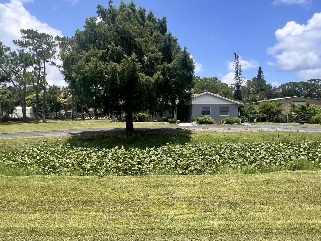 Photo of 11415 46TH Place N, The Acreage, FL 33411 (MLS # B26053638)